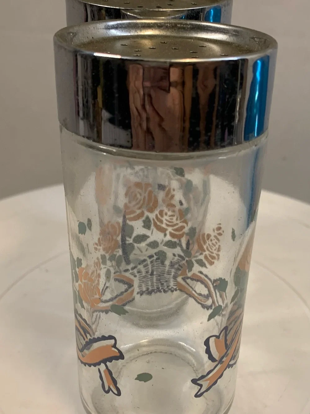 Vintage Ancho Hocking “Basket, Ribbons & Roses Salt & Pepper Shakers.       3801